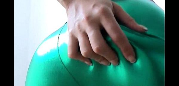  These shiny green PVC panties cling to my pussy
